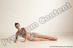 Swimsuit Gymnastic poses Woman White Moving poses Slim long brown Dynamic poses Academic